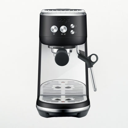 Black coffee machine with clear glass front on a white background